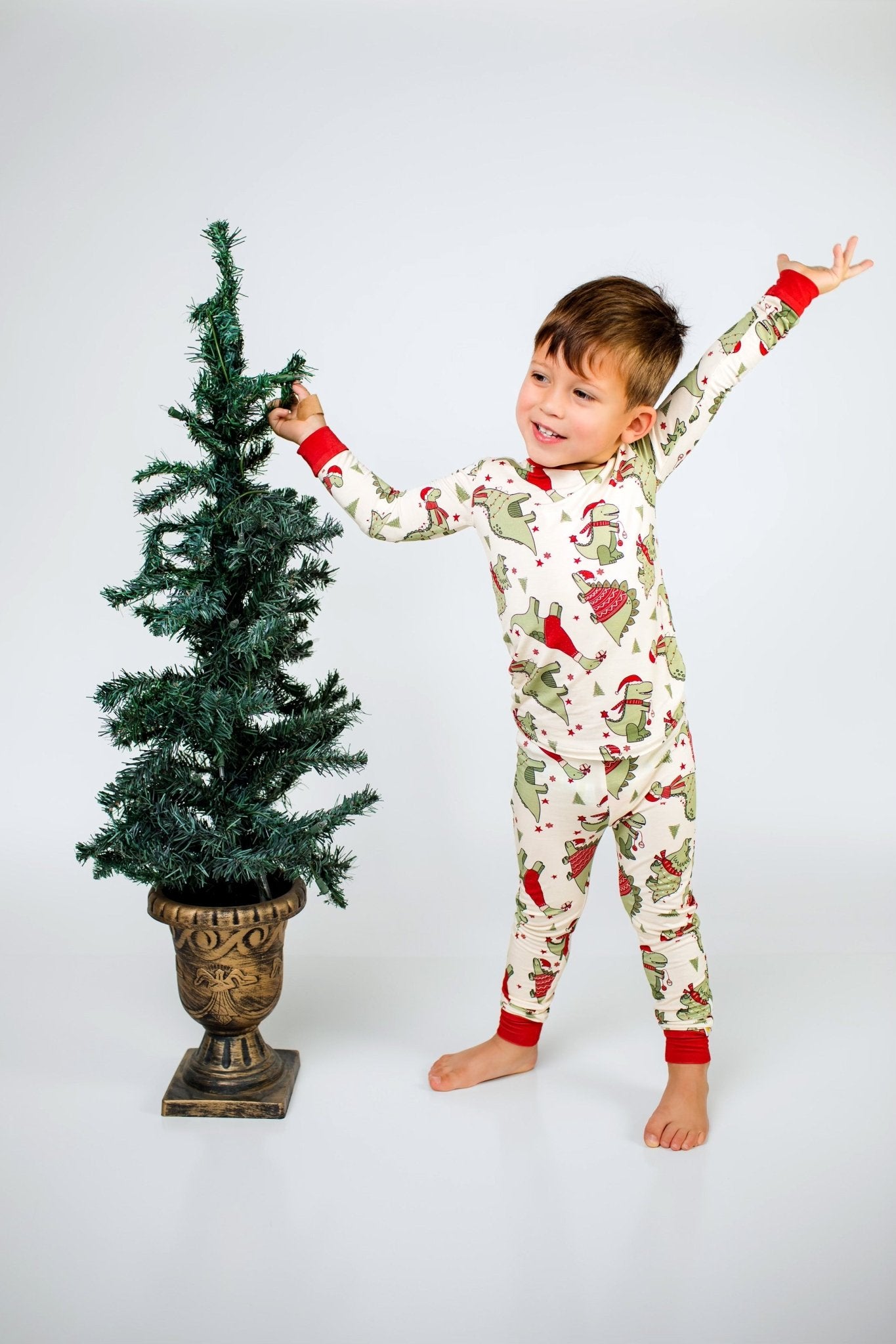 bamboo pajamas, sleepwear, kids bamboo pajamas, bamboo, dino, dinos, dinosaurs, christmas, santa hat, christmas sweaters, t-rex, raptor, dino pajamas, dinosaur pajamas